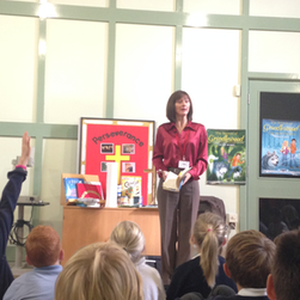 Jackie Burke, author of The Secrets of Grindlewood series for children, taking questions during a school visit