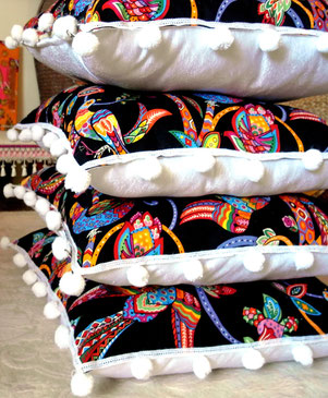 Designer fabric, upholstery cotton, cushion cover with colourful bird-of-paradise design on black background & vintage-lace trim