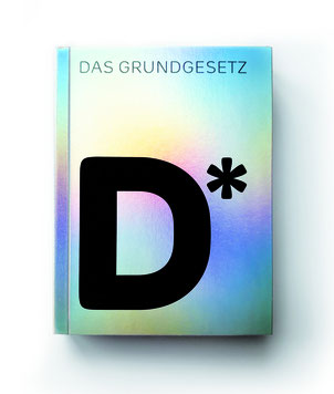 Auf dem Cover von "Neues Grundgesetz (#2)" ist der Buchstabe "D" mit einem Asterisk.