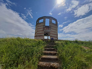 Ruins of yellow brick tower in Zvārde Parish, Latvia, from which Soviet officers guided bomb drops onto a target range