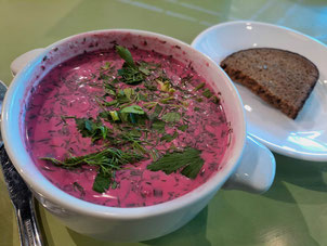 Pink Latvian cold beet soup and a slice of rye bread