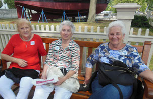 A Bench under a Tree is Just what these Three Needed