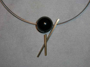 collar,- steel, gold and onix. 1985