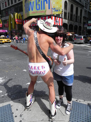 THE NAKED COWBOY