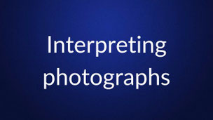 White text reading “Interpreting photographs” is centered on a plain dark blue background.