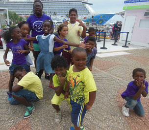 Dancers perform near the ship at the Royal Naval Dockyard in Bermuda