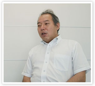 インタビューに応える姫井浩明さん