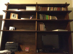 TV and library, with books in three languages