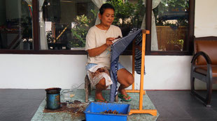 Woman practicing batik