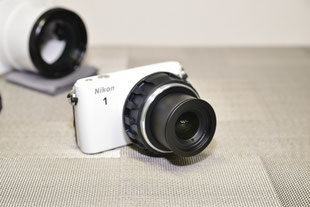 Nikon WP-N2の付属部品をNikon 1 S1に装着したレンズの鏡筒部に装着した状態