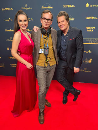 Sarah von Neuburg, Lars-Christian Karde, Andreas Piasek auf dem roten Teppich der Goldenen Henne in Leipzig.