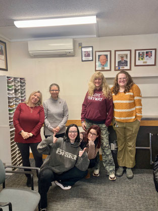 Group photo of Whelden Memorial Library staff during CPR and emergency response training at the West Barnstable Fire Department.
