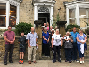 Some of our drivers, staff and volunteers outside the new building