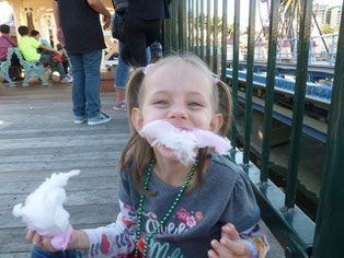 Naomi eating Cotton Candy at Disneyland