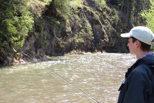 flyfishing deep pool in mountain stream for trout