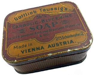 English language Gottlieb Taussig's soap tin (from the MOFBA collection)