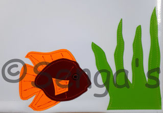 Fisch mit Seegras