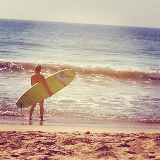 Me trying out surfing for the first time. Tough workout!