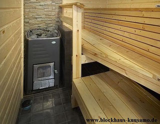 Sauna im Wohnblockhaus - Holzofen - Blockhhausbau  - Wellness im Blockhaus - Holzhaus in Blockbauweise