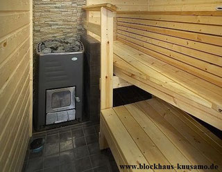 Sauna im Wohnblockhaus - Holzofen - Blockhhausbau  - Wellness im Blockhaus - Holzhaus in Blockbauweise