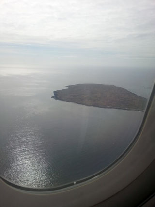 View from the plane over the Galapagos - a place that would be rather joyless without splashing a bit of cash. Dante Harker
