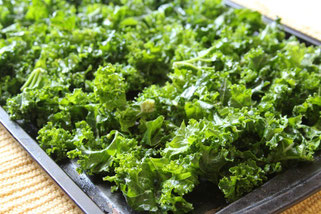 kale pieces before they are baked and turn into delicious kale chips