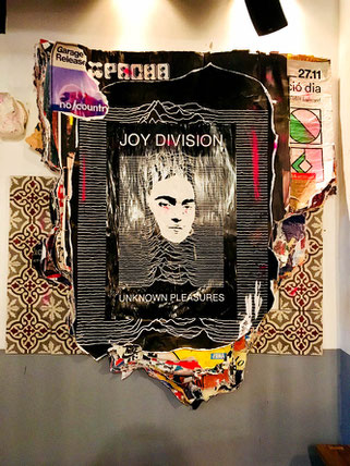 Joy Division poster at a bar