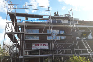 Renovatie daken, vervangen dakgoten en buitenschilderwerk jaren 30 woningen in Leiden