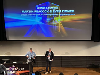 Even Zimmer and Martin Peacock holding a presentation