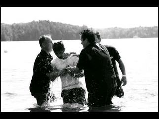Baptism of young man through one of our partners