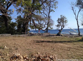 Amed beachfront land for sale