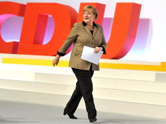 Angela Merkel hat vor dem CDU-Parteitag ihre Position bekräftigt, dass es mit ihr keine Flüchtlingsobergrenze geben kann. Foto: Bernd von Jutrczenka/Archiv