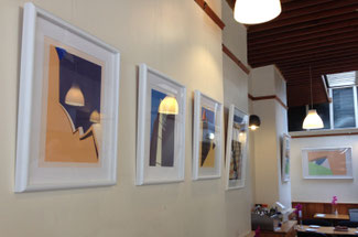 The framed screen prints on display at the exhibition