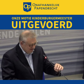 De motie werd unaniem aangenomen.
