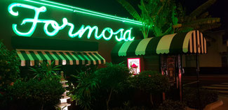 The "Formosa Cafe" is right across the street from the Hollywood studio "The Lot". John Wayne used to ate there whenever he worked on the sets of the old Samuel Goldwyn Studios.