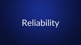 White text reading “Reliability” is centered on a plain dark blue background.