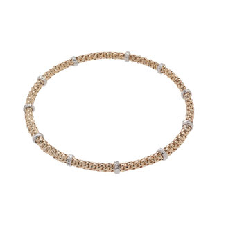 Bracciale morbido tubolare in oro rosa 18kt con anelli faccettati 
