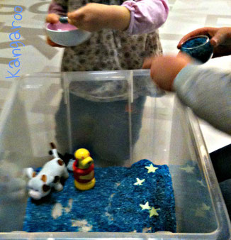 free play with the rice sensory bin