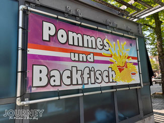 Banner mit Pommes und Backfisch