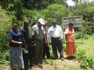 Board of Directors evaluating implemented project activities (from left to right: V. Sachore, G. Msuya, J. Nshare, villager, B. Mkwizu, N. Maliwa)