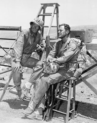 John Wayne and John Agar on set for "Sands of Iwo Jima" at the Pendleton Marine base.