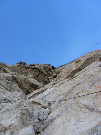 Chrissi leading the first roof pitch. Ropes and Slovakians ahead!