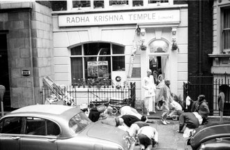 Srila Prabhupada greeted by disciples in original Hare Krishna temple in London (late 60`s)