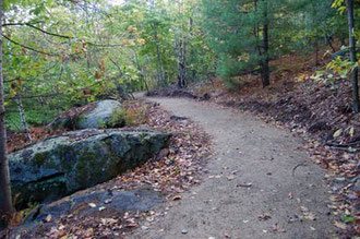 A section of accessible hiking trail at Crotchet Mountain Rehabilitation Center in Greenfield, New Hampshire. This incredible trail system was designed and built by Peter Jensen and Associates, LLC.