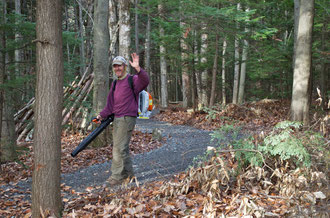 Michael Nerrie clearing leaves from the Distant Hill Nature Trail.