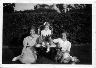 Margaret and Sheena Swanney with cousin Eleanor Swanney and dog (Hector?) about 1939-1940, possibly at Marybank, Croy, Inverness-shire. Photographer unkown.
