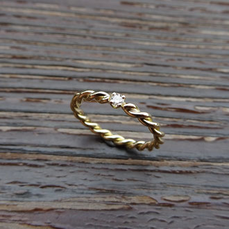 Verlobungsring "Kordel" in Gelbgold 750 mit Brillant in Grifffassung, Kundenanfertigung