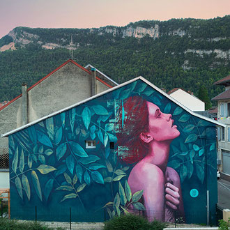 Fresque street-art à Nantua (Ain) par l'artiste peintre muraliste GRAFFMATT peinture murale lors du festival Woua'art commande professionnelle graffiti artiste streetart 