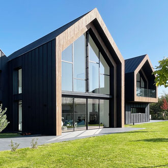 MAISON INDIVIDUELLE - JOUY EN JOSAS - YVELINES_BOIS PREFABRIQUE ET ZINC NOIR