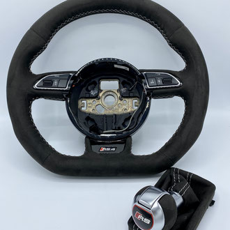 Volant Audi RS4 Amantea noir, épaississement de la jante en IV3 Aéro, point de croix, fil gris, gainage pommeau et soufflet assorti